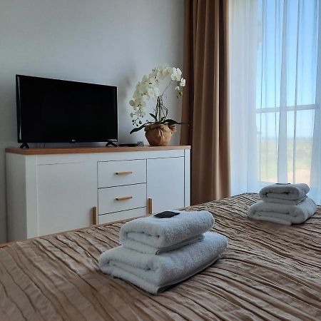 Aqua Apartments Sunset Reda Luaran gambar